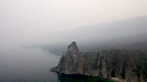 Scenic big mountain, cliff in Sandy Lake Baikal Stock Footage 154498059