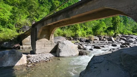 Scenic Bridge Over a Clear Mountain River Video stock 340277749