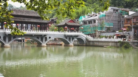 Scenic bridge over the Tuojiang River, Fenghuang, China Stock Footage 83590691