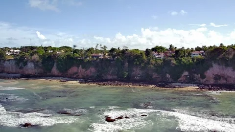 Scenic cliffs and ocean waves at Praia de Pipa, Rio Grande do Norte. 스톡 동영상 314401817