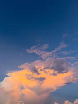 Scenic Cloudscape with Golden Light at Sunset Stock Photos