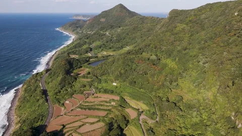 Scenic Coastal Cliffs Overlooking the Blue Ocean – Aerial View Stock Footage 336966538