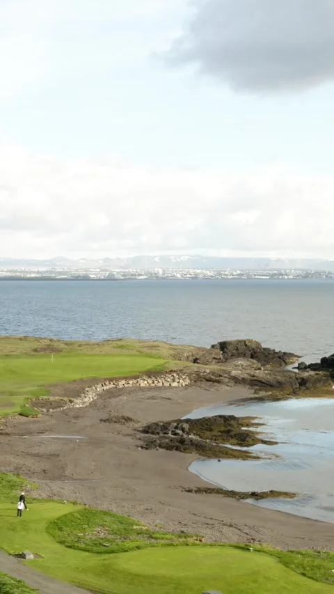Scenic Coastal Golf Course with Ocean and City View Video stock 340545656