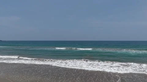Scenic Coastal Ocean Beach View with Rolling Gentle Waves 4K Stock Footage 343368667