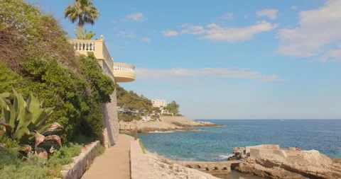 Scenic Coastal Path and Mediterranean Sea View at Cap d'Ail, French Riviera Stock Footage 342935016