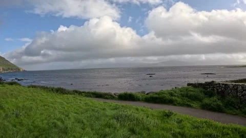 Scenic coastal path and ocean view in historic Kirkjubour, Faroe Islands Stock Footage 339796870