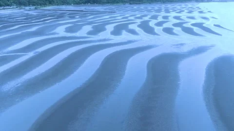 Scenic Coastal Patterns of Okoshiki Beach from Above Stock Footage 336389916