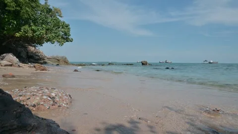 Scenic Coastal View with Rocks and Calm Ocean Waves at Shoreline Stock Footage 296479629