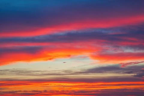 Scenic color cloudscape of dramatic clouds in the sky sunrise sunset landscape Stock Photos