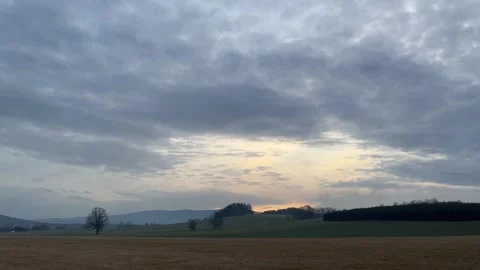 Scenic Countryside Sunset with Dramatic Clouds Stock Footage 304008877