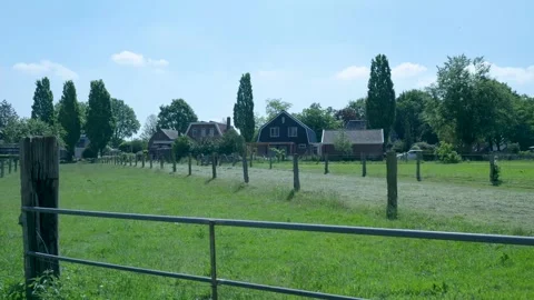 Scenic crane down shot of a rural dutch landscape Stock Footage 336903147