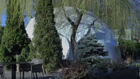 A Scenic Dome Structure That is Elegantly Surrounded by Beautiful Lush Greenery Stock Footage 312440552