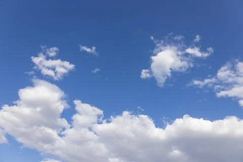 Scenic dramatic summer clouds. Cloudscape of bright blue sky. Cloud backgroun Stock Photos