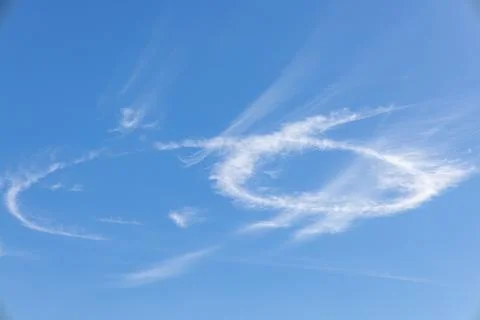 Scenic dramatic summer clouds. Cloudscape of bright blue sky. Cloud backgroun Stock Photos