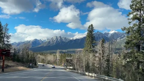 Scenic Drive into Canmore, Alberta – Spring Mountains View Video stock 308437737