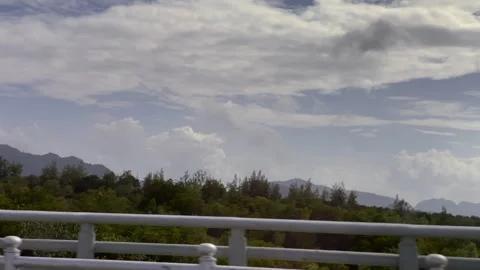 Scenic Drive over Bridge with Mountain and Landscape under Cloudy in Lanta Krabi Stock Footage 344875099
