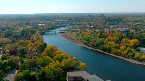 Scenic Drive Over River in Fall in Eau Claire, 4K Drone Footage Stock Footage 231183309