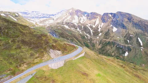 Scenic drive through stunning alpine mountains on a winding road in summer Video stock 314079638