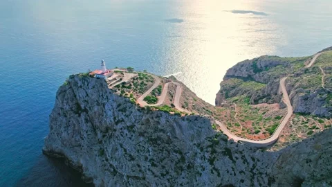 Scenic drone Cap de Formentor Lighthouse view on high rocky cliffs in Majorca. Stock Footage 197487432