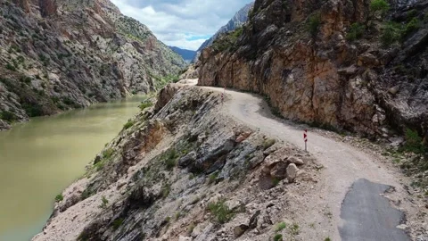 Scenic drone flight inside the deep gorge of Karanlik Canyon showing the narrow Video stock 336408631