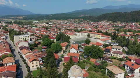 Scenic drone flight over forests and town of Razlog, Bulgaria Stock-Footage 344057367