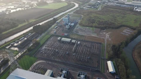 Scenic drone flight over a major gas powered electricity generation site in Stock Footage 336323241
