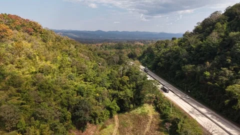 Scenic Drone Flight Over Mountain Range and Fluffy Clouds Video stock 327507188