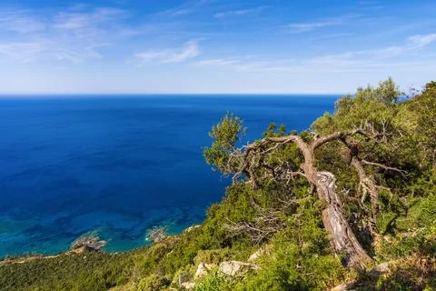 Scenic drone shot capturing pristine coastline of Fountain Amoros. Dramatic r Stock Photos