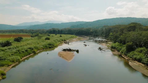 Scenic drone view of Tarcoles River and green mountains in rural Costa Rica Video stock 327454352