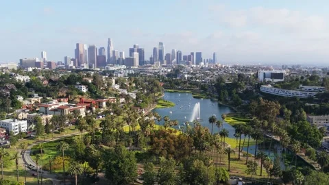 Scenic Echo Park Lake and downtown Los Angeles skyline, revealing green urban oa Stock Footage 336634477