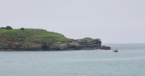 Scenic Exploration of Rugged Coastal Cliffs 스톡 동영상 303453572