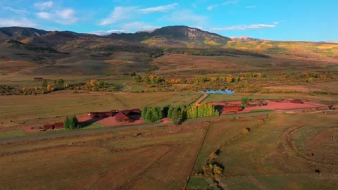 Scenic Fall autumn drive Mill Creek Ranch farm land Ohio Creek Valley Pass near Stock Footage 323066412