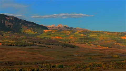Scenic Fall autumn drive Mill Creek Ranch farm land Ohio Creek Valley Pass near Stock Footage 323152940