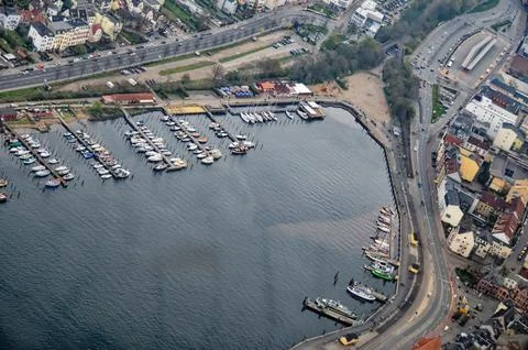 Scenic Flensburg harbor town with yachts, boats, and coastal marina view Stock Photos