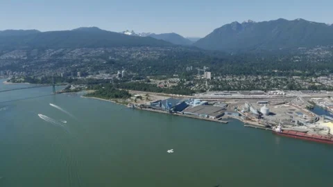 Scenic floatplane shot over Vancouver &amp; explore the iconic Lions Gate Bridge. Stock Footage 230884016