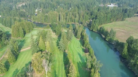 Scenic Golf Course with a Winding River Stock Footage 318817722