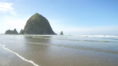 Scenic Haystack Rock on the Oregon beach coast of Pacific Ocean. Stock Footage 84264585