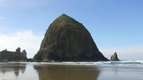 Scenic Haystack Rock on the Oregon beach coast of Pacific Ocean. Stock Footage 84264880