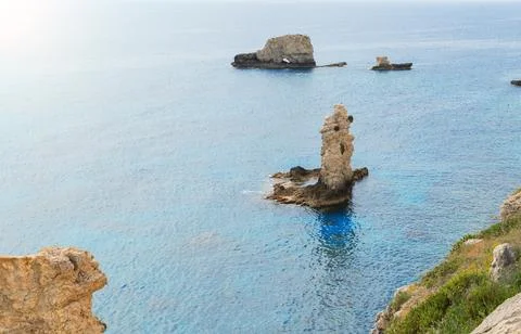 A scenic high angle perspective of rugged rock formations emerging from the c Fotos de archivo