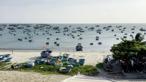 A scenic high-angle view of a coastal bay filled with numerous traditional .. Stock Footage 337354298