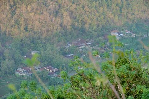 Scenic high angle view of a misty rural valley. Stockfoto's