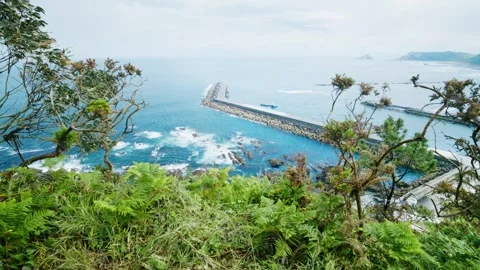 Scenic high angle view of an ocean breakwater Stock Footage 336108977