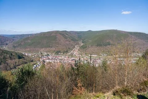 Scenic Hilltop View Over Forested Valley and Small Village Panorama in Rural Stock Photos