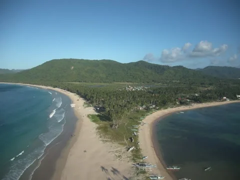 A scenic Hyperlapse Drone view of El Nido Nacpan palm tree Twin Beach Palawan Stock Footage 302522850
