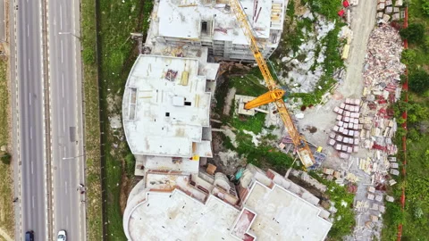 Scenic illustration of foundation work among construction tools and debris. Stock Footage 340137719