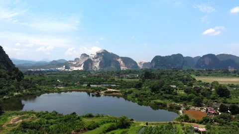 A scenic lake with mountain background Stock Footage 231709580