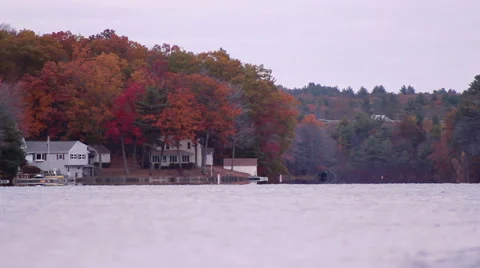 A scenic lake surrounded by fall leaves in Sturbridge, MA. Stock Footage 57249909