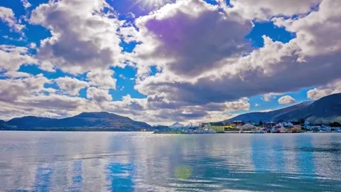 Scenic Lake View with Mountain Range and Cloudy Sky 스톡 동영상 310324537