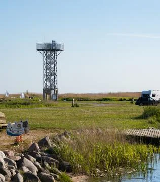 Scenic Lakeside Viewpoint with Observation Tower and Campsite Stock Photos