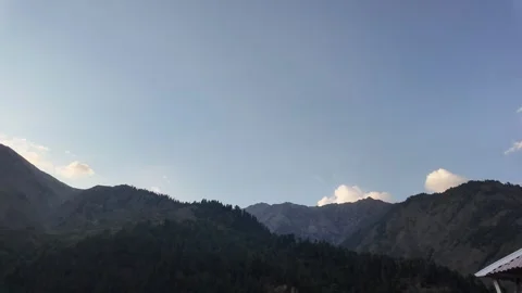 Scenic Landscape of an Evening View Featuring Trees and Majestic Mountain Ra Stock Footage 289193443